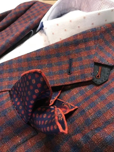 Rust checkered blazer with pocket square detail by Bespoke By CB Miami