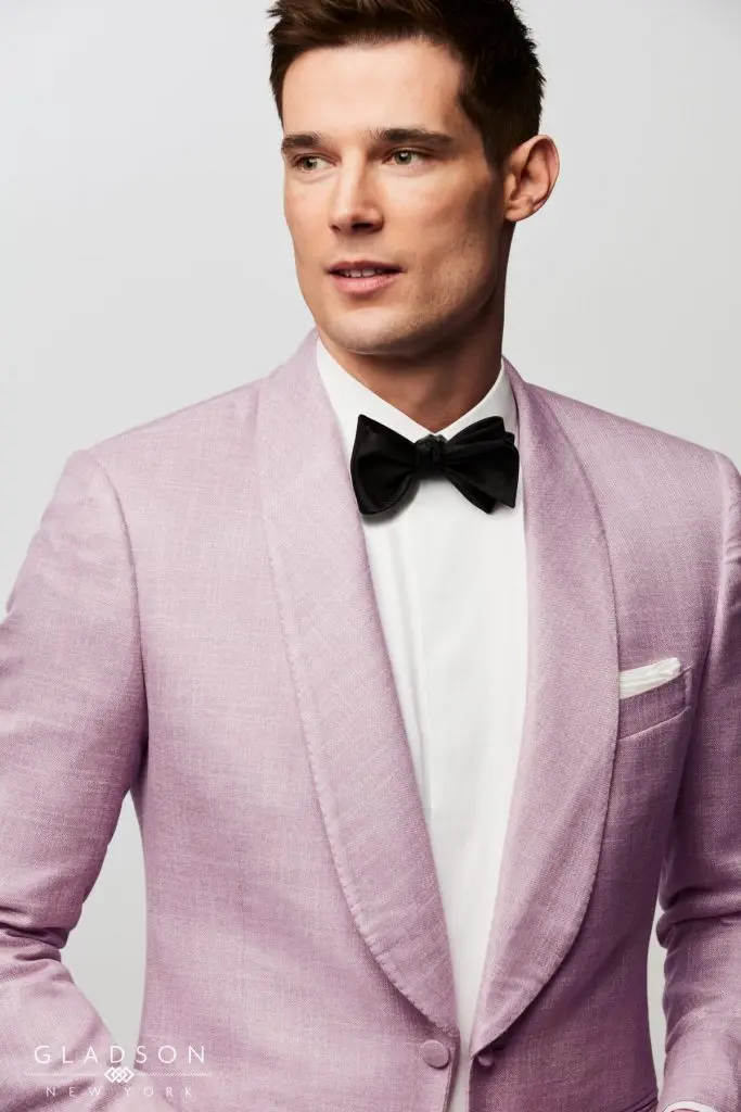 Custom lavender linen tuxedo jacket with shawl lapel and black bow tie from Bespoke By CB Miami