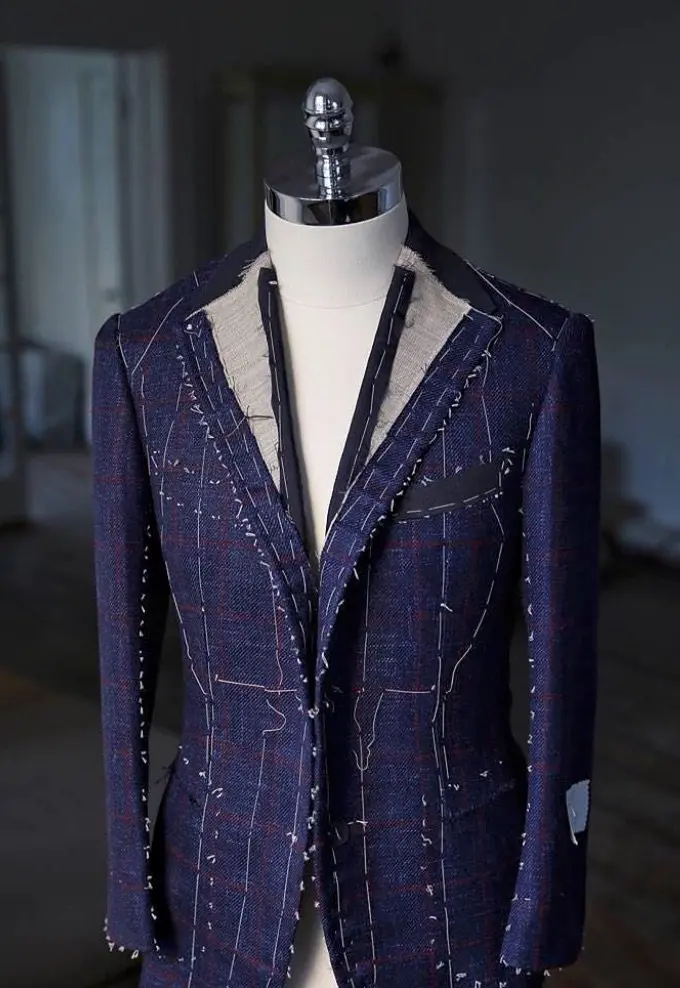 Close Up Of Bespoke Suit Construction Details Including Hand Stitching custom menswear detail by Bespoke By CB Miami