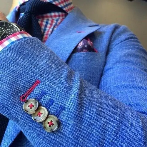 Custom blue linen sport coat with surgeon cuffs and red contrast stitching from Bespoke By CB Miami