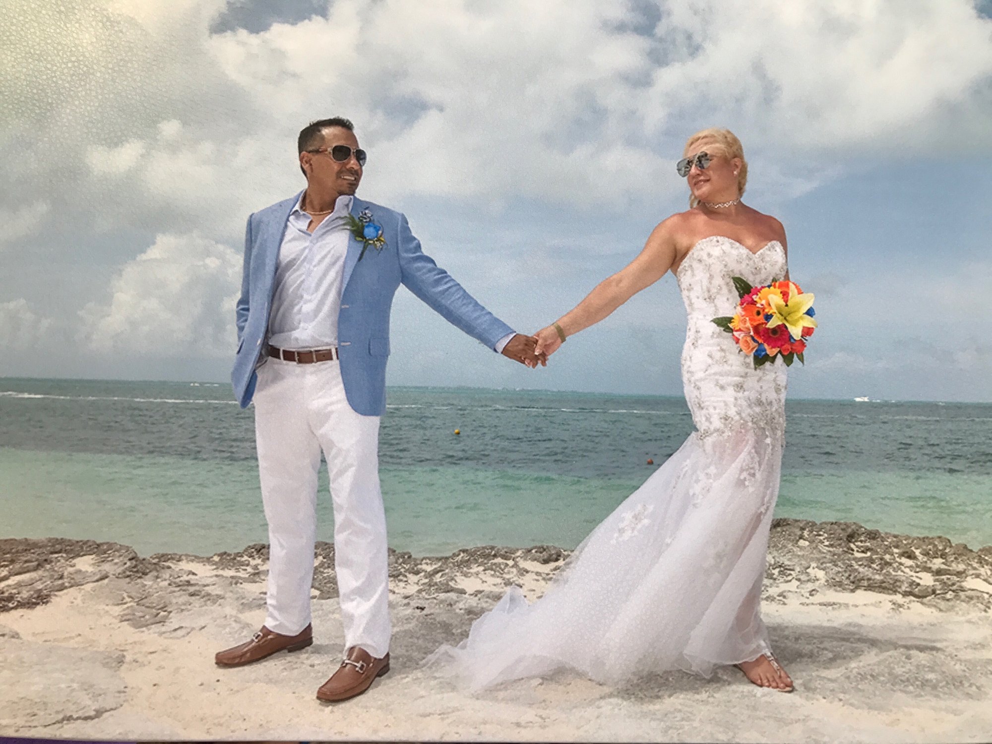 Light blue linen suit for a beach wedding, styled by Bespoke By CB