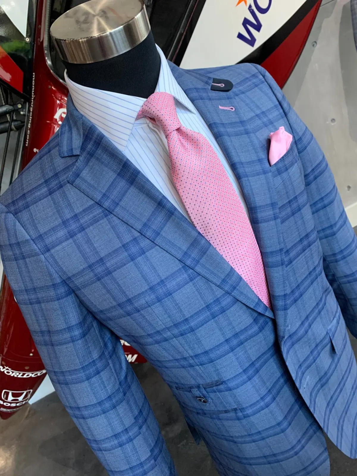 Bespoke Cb Consultant Helping A Client Choose Between Essential Suit Types For A Professional Wardrobe custom menswear.