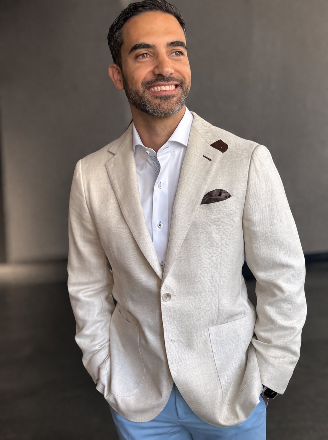 Men wearing a custom linen shirt and lightweight tailored trousers as resort wear in Miami by Bespoke By CB
