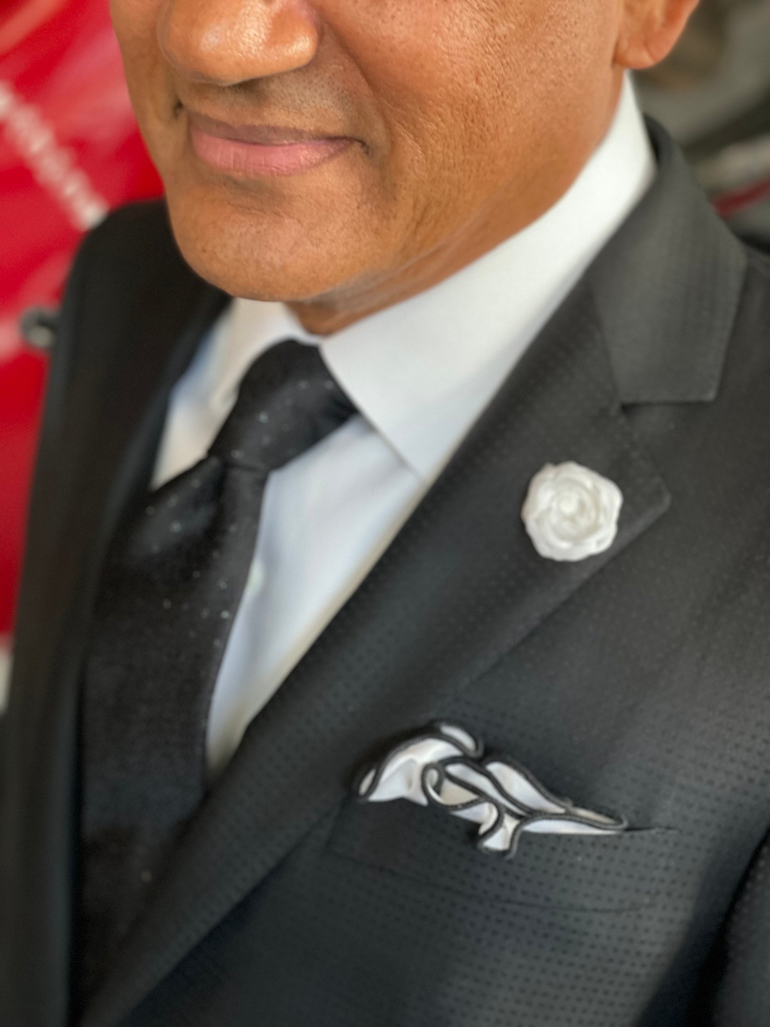Custom tuxedo jacket with peak lapels styled for a black tie optional event at Bespoke By CB Miami