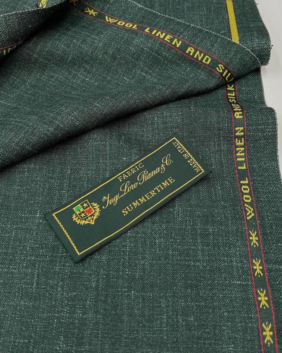 Luxury suit fabric swatches showing premium wool and silk blends available at Bespoke By CB Miami