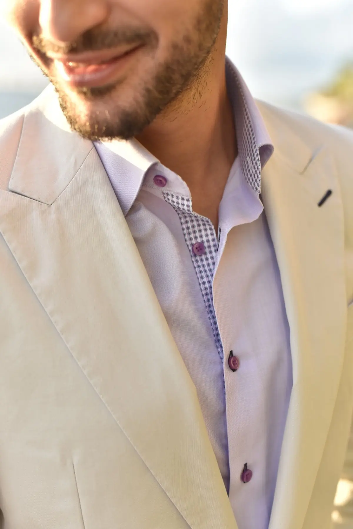 Custom cream blazer with peak lapels paired with lavender dress shirt at Bespoke By CB Miami