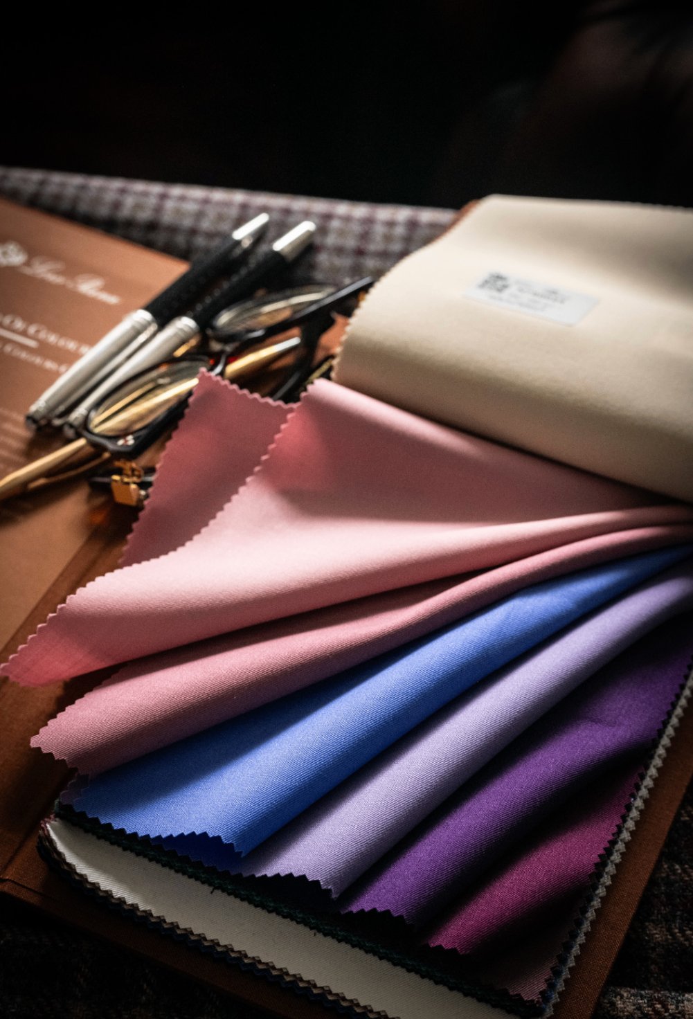 Loro Piana swatch book, colorful fabric collection at Bespoke By CB Miami