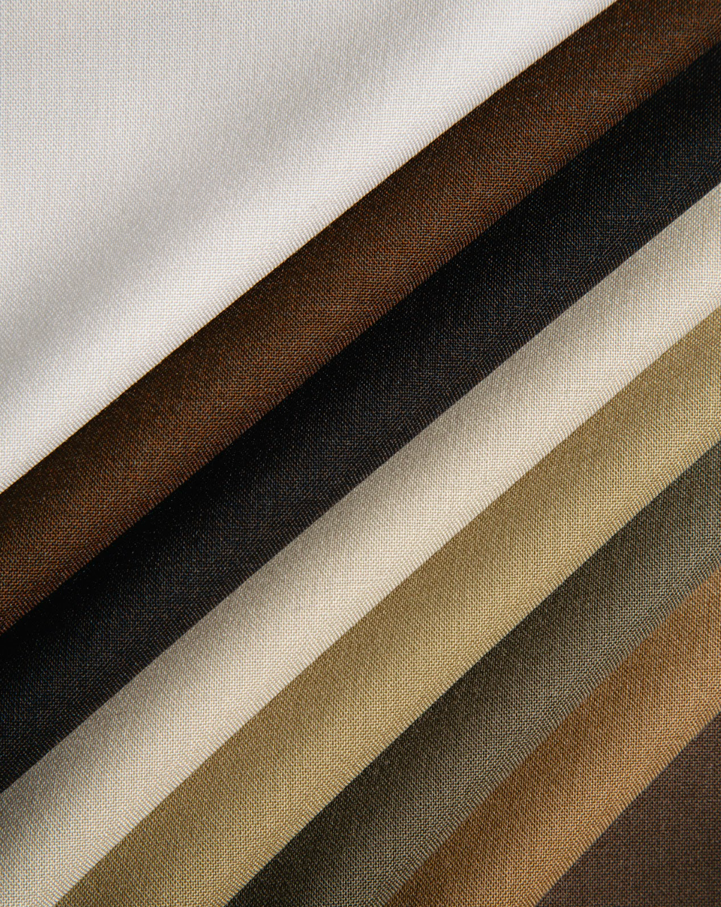 Drago Solanus fabric swatches in cream, brown, charcoal, tan, and olive