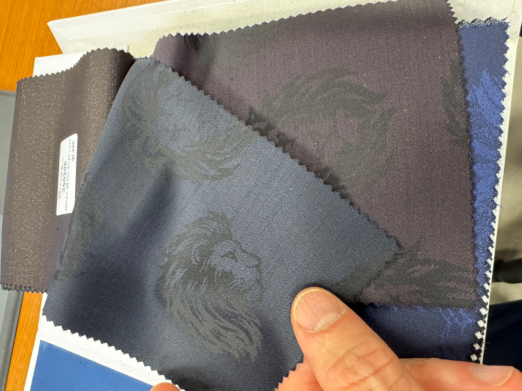 Custom dinner jacket made from Caccioppoli lion fabric showing the rich texture and pattern