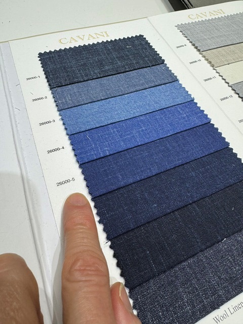 Fabric swatch book showing the blue linen wool silk blend options by Bespoke By CB Miami