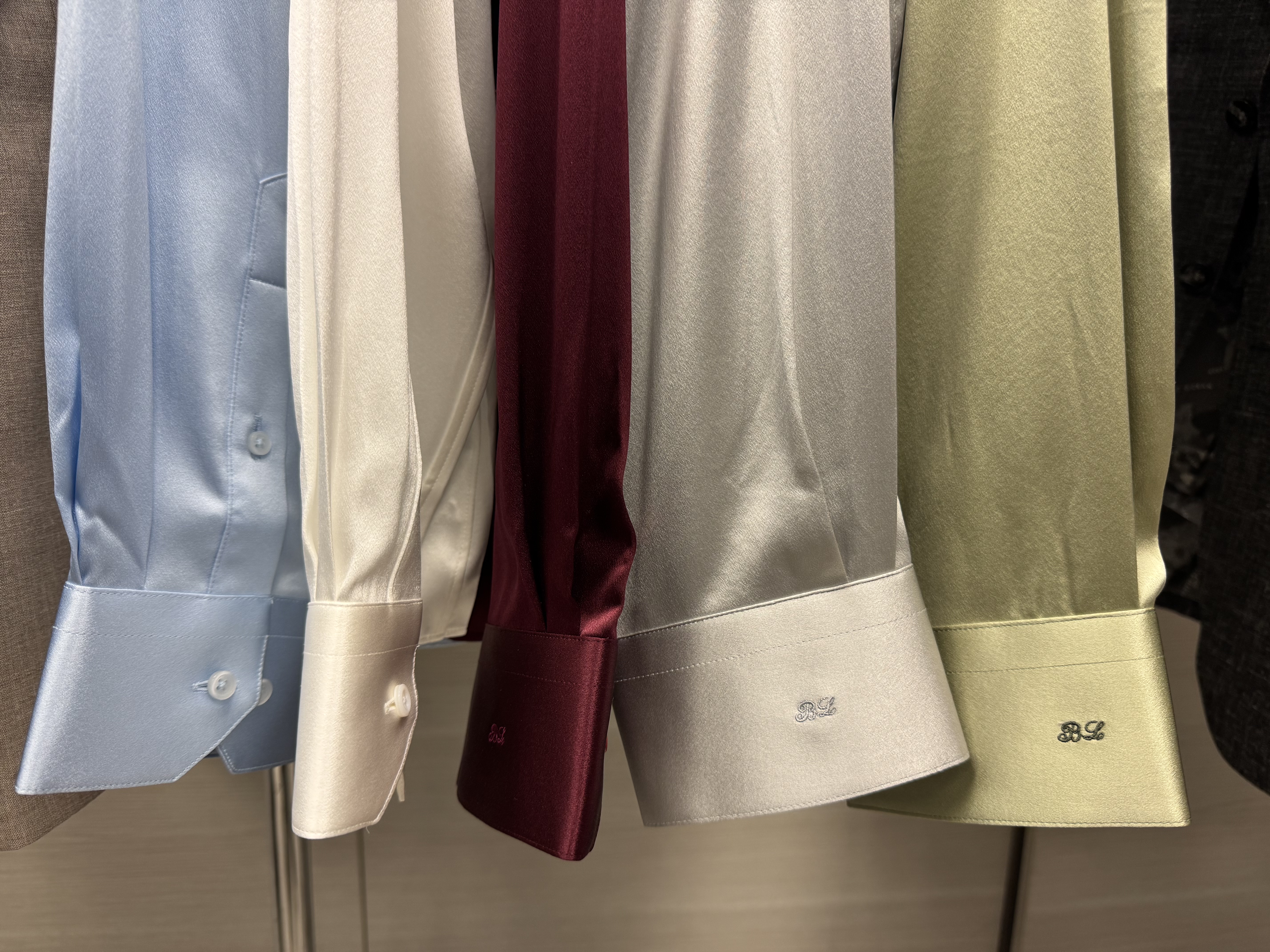 Burgundy and olive silk shirts with BL monogram embroidery showcasing custom formal shirt options