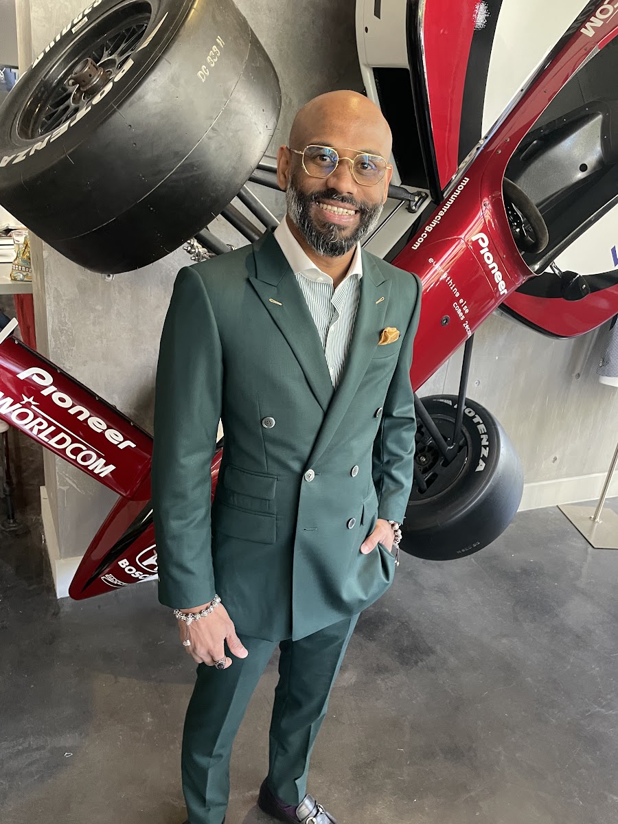 Bespoke Cb Consultant Helping A Client Choose Between Essential Suit Types For A Professional Wardrobe custom menswear.