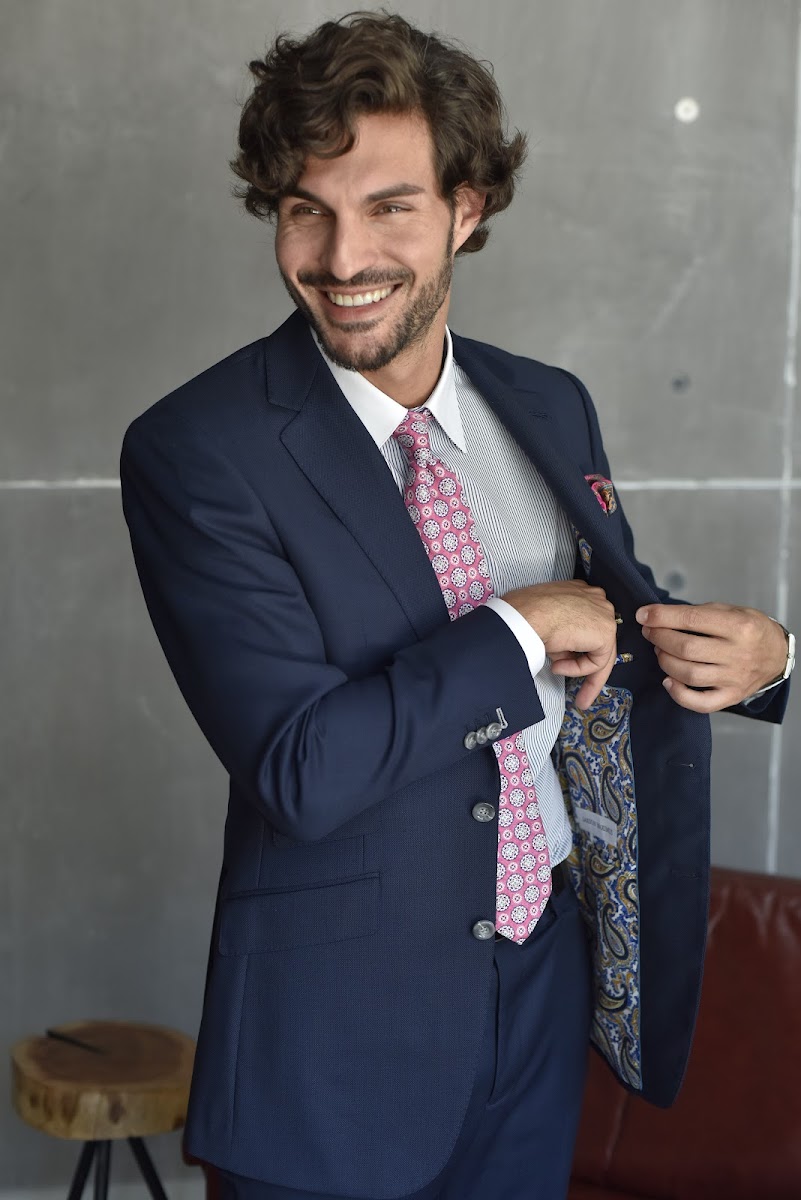 Man In A Navy Custom Suit With Paisley Lining By Bespoke Cb custom menswear detail by Bespoke By CB Miami
