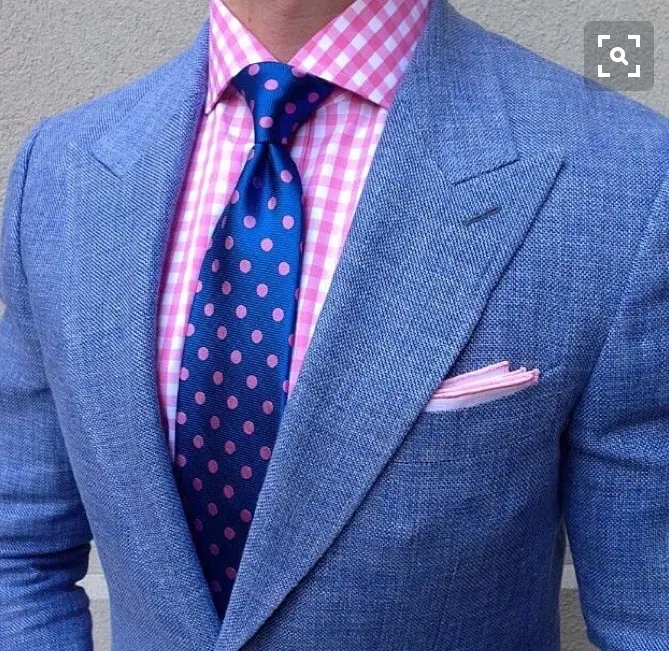 Close Up Of Luxury Suit Fabric Texture And Weave Patterns At Bespoke Cb Showroom custom menswear detail by Bespoke By CB.