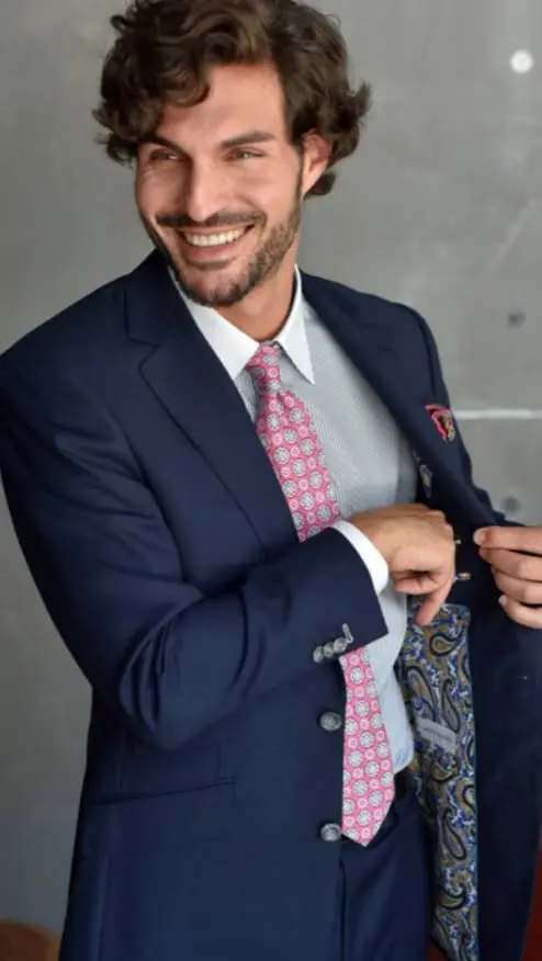 Tie knot and length detail with custom suit by Bespoke By CB Miami