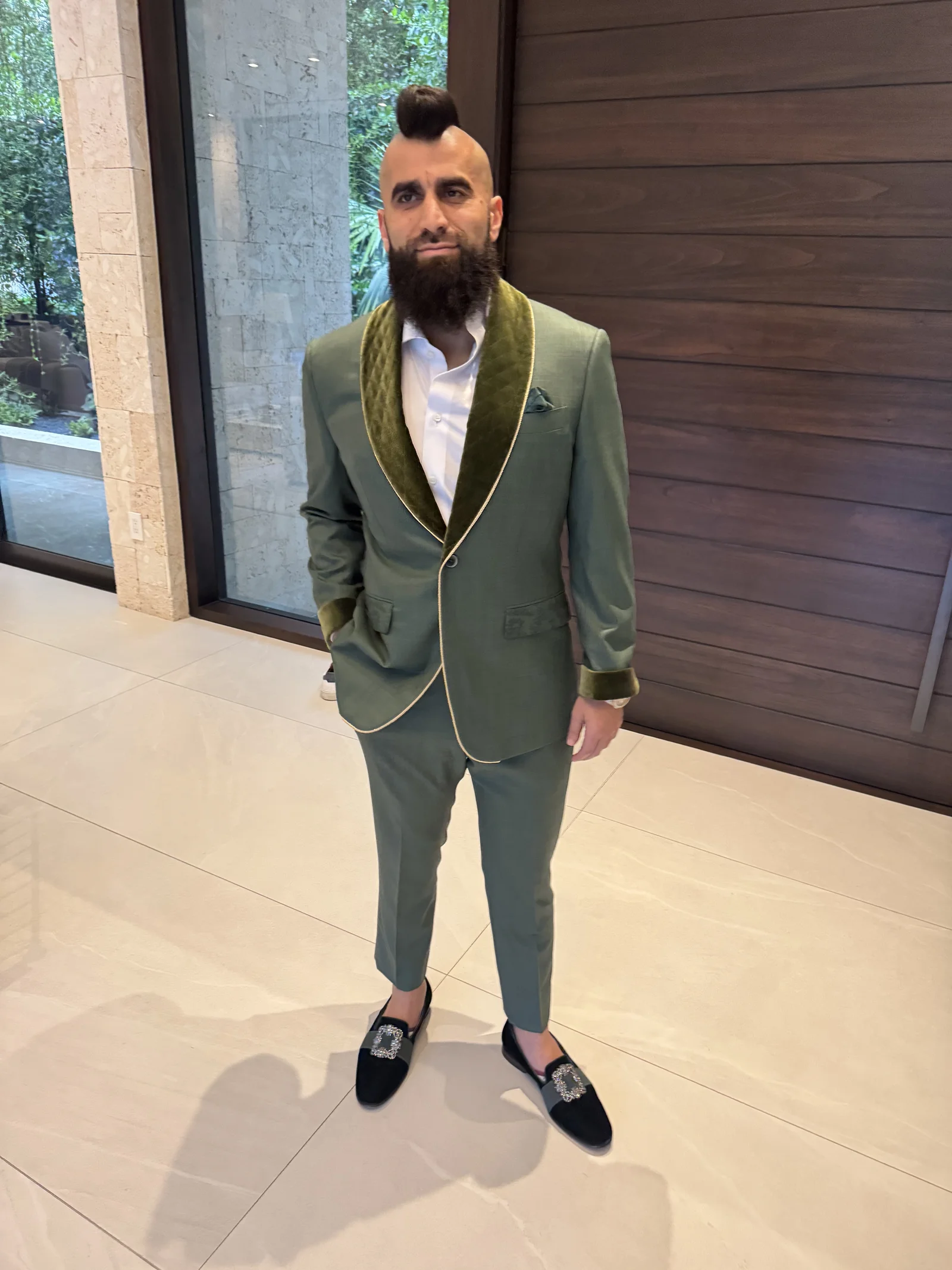 Robert Rivani in custom sage green tuxedo with velvet shawl lapel by Bespoke CB