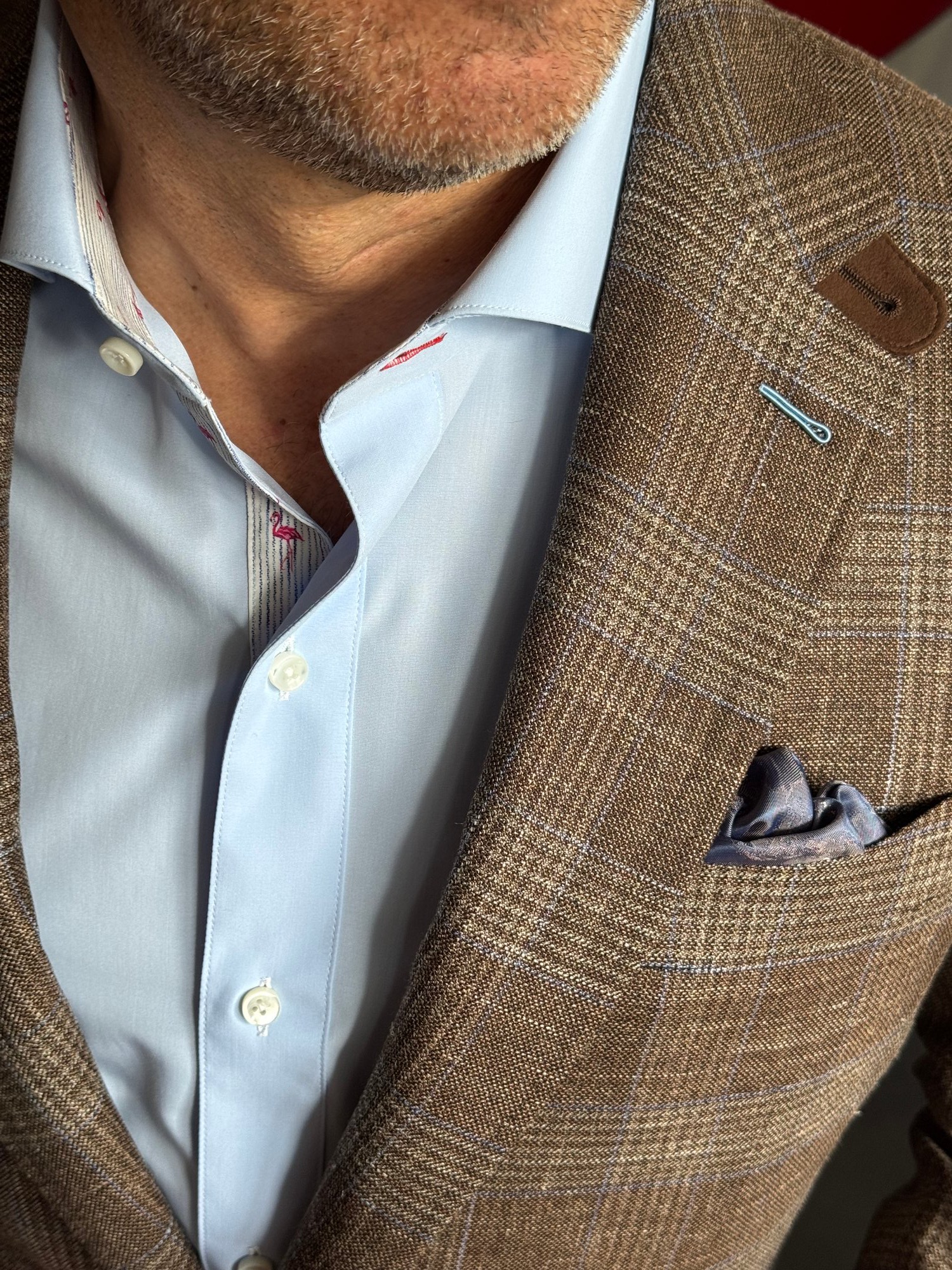 Brown glen plaid custom blazer with light blue dress shirt and patterned pocket square
