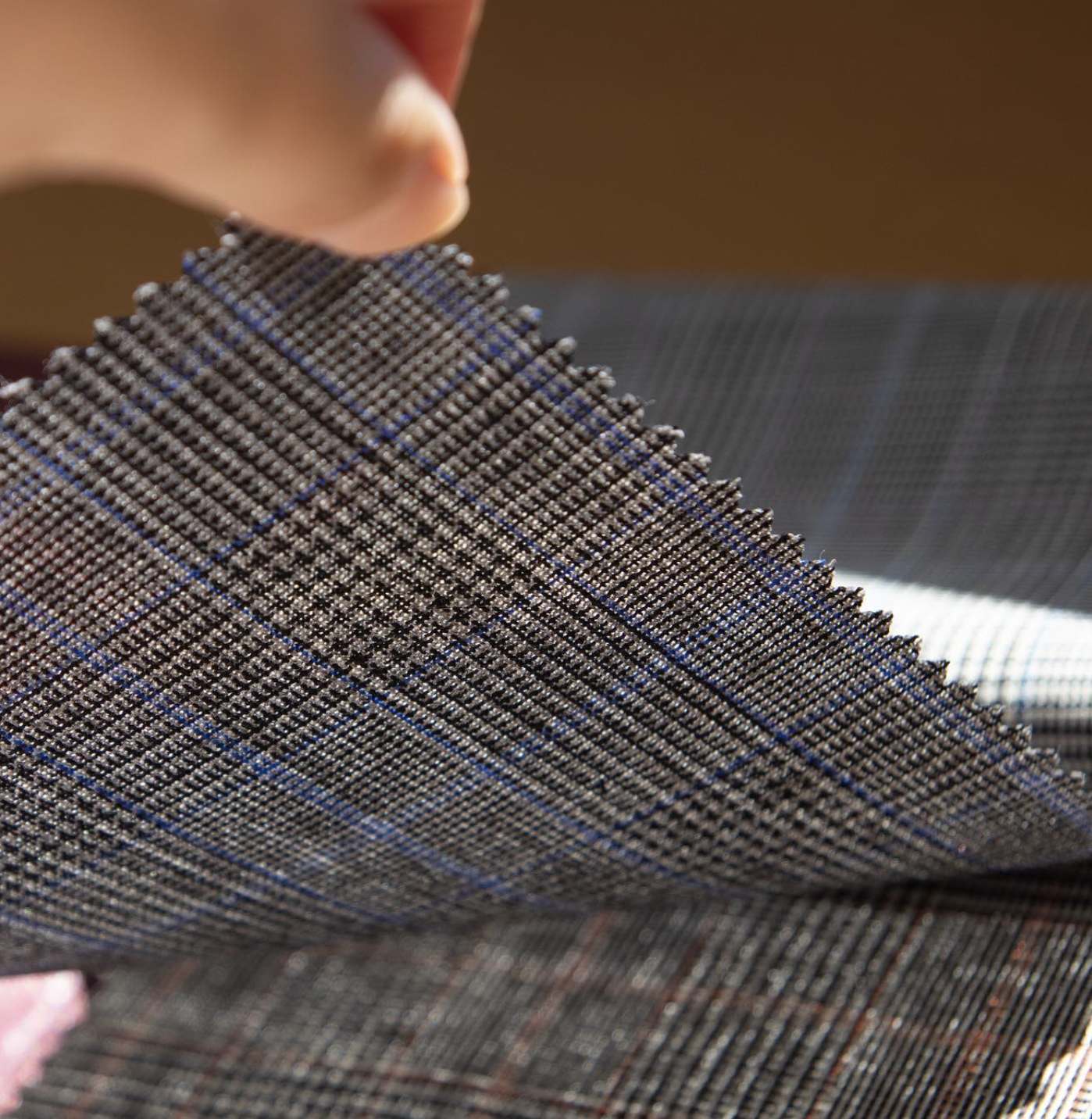 Hesworth gray check fabric swatch showing weave detail