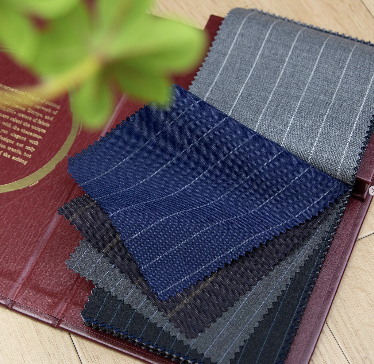 Hesworth fabric swatch book with plaid pattern in gray and blue