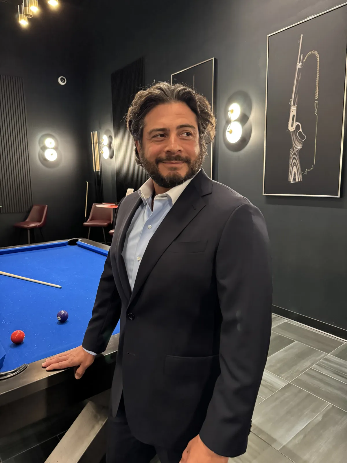 Man Wearing A Charcoal Grey Suit At A Professional Business Meeting In Miami custom menswear detail by Bespoke By CB Miami