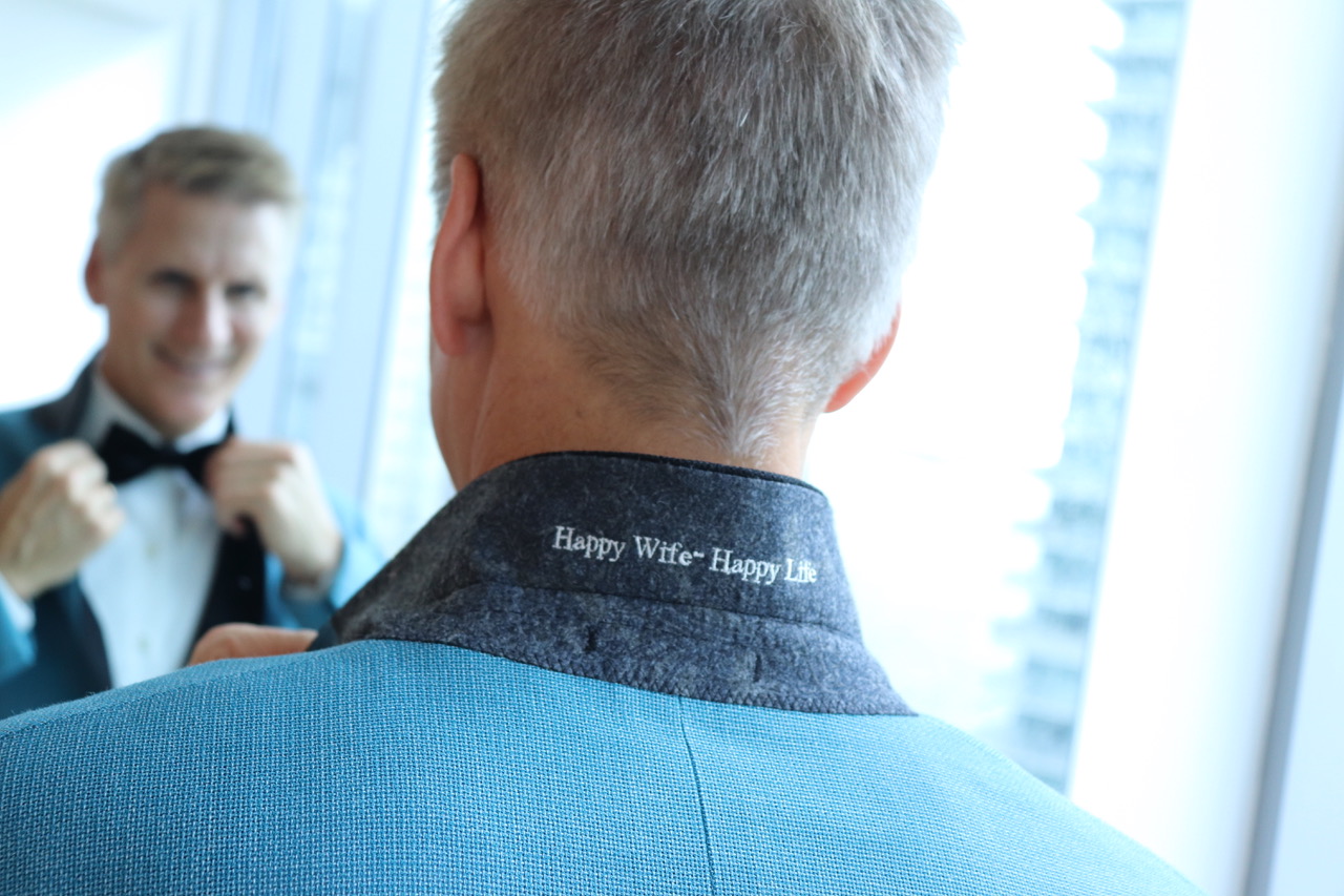 Blue wedding tuxedo by Bespoke By CB Miami — custom wedding attire with groomsmen valet service