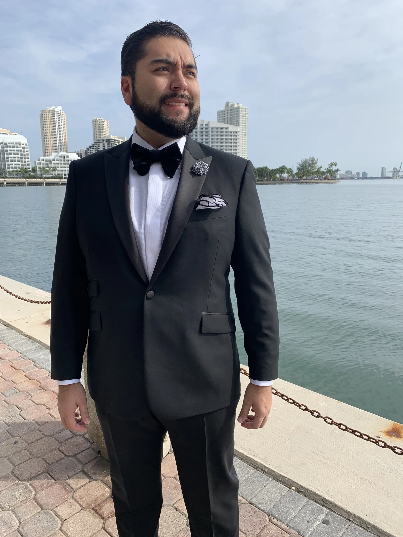 Custom tuxedo portrait showing superior construction and fabric quality in Miami.