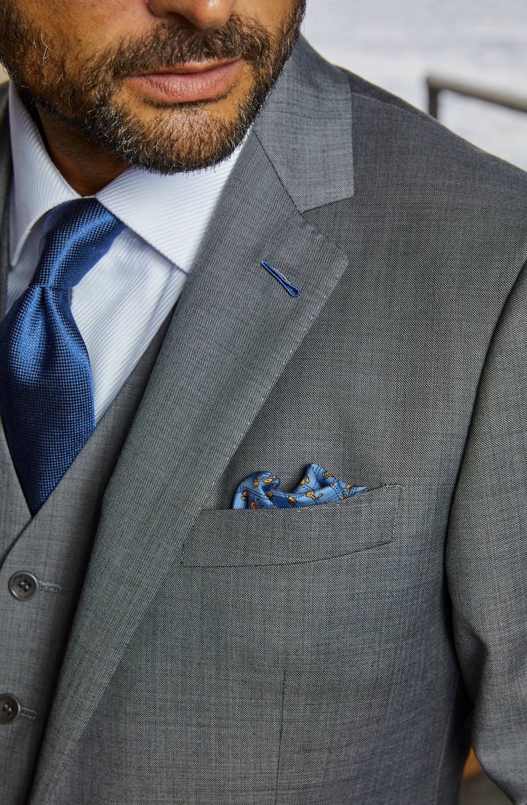 Three piece custom suit with vest crafted by Bespoke By CB showing superior fit and construction.