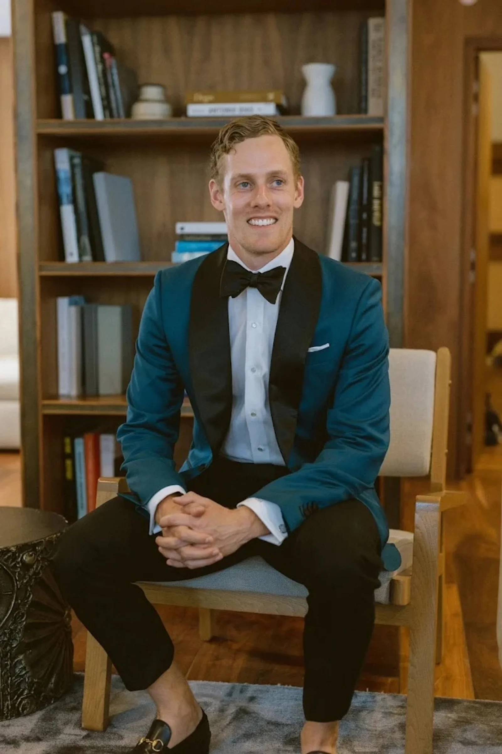 Formal custom tuxedo portrait showcasing elegant tailoring and premium fabric.