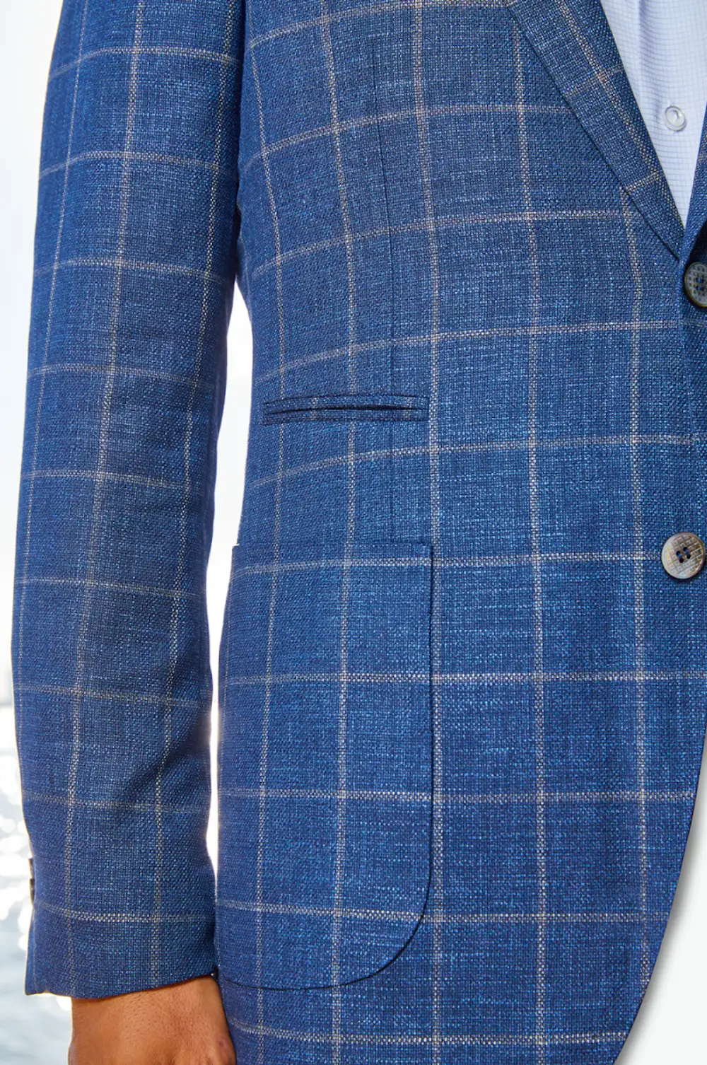Blue windowpane check blazer styled for a business casual office environment