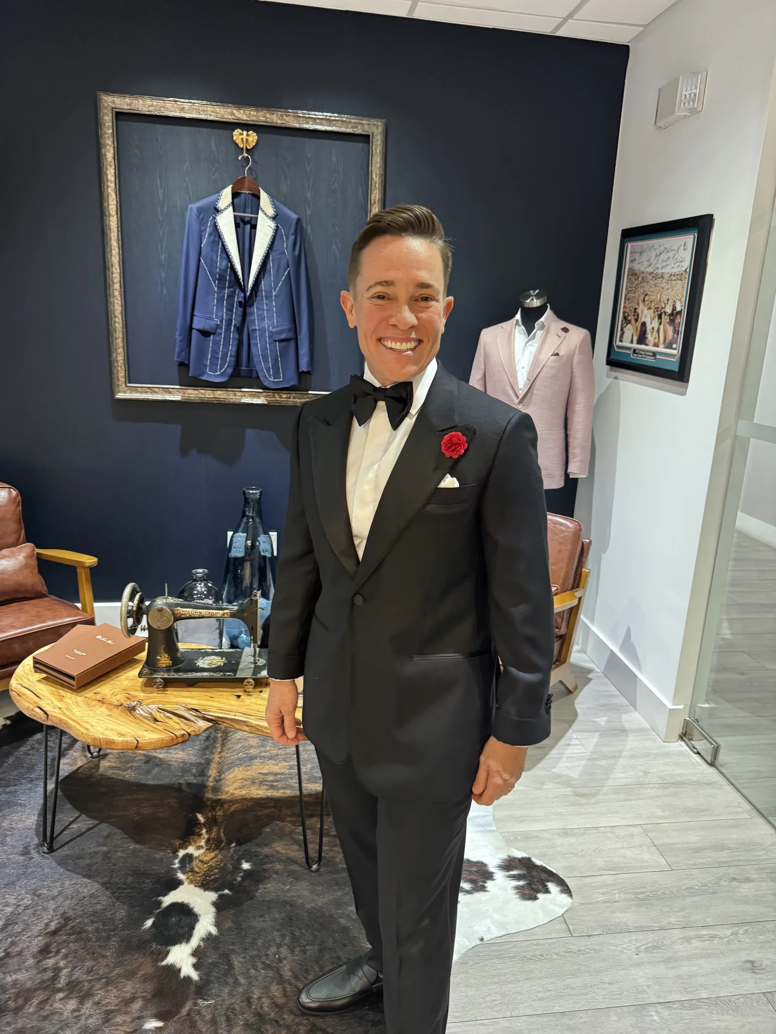 Tuxedo fitting with red boutonniere, custom tuxedo shirt detail by Bespoke By CB